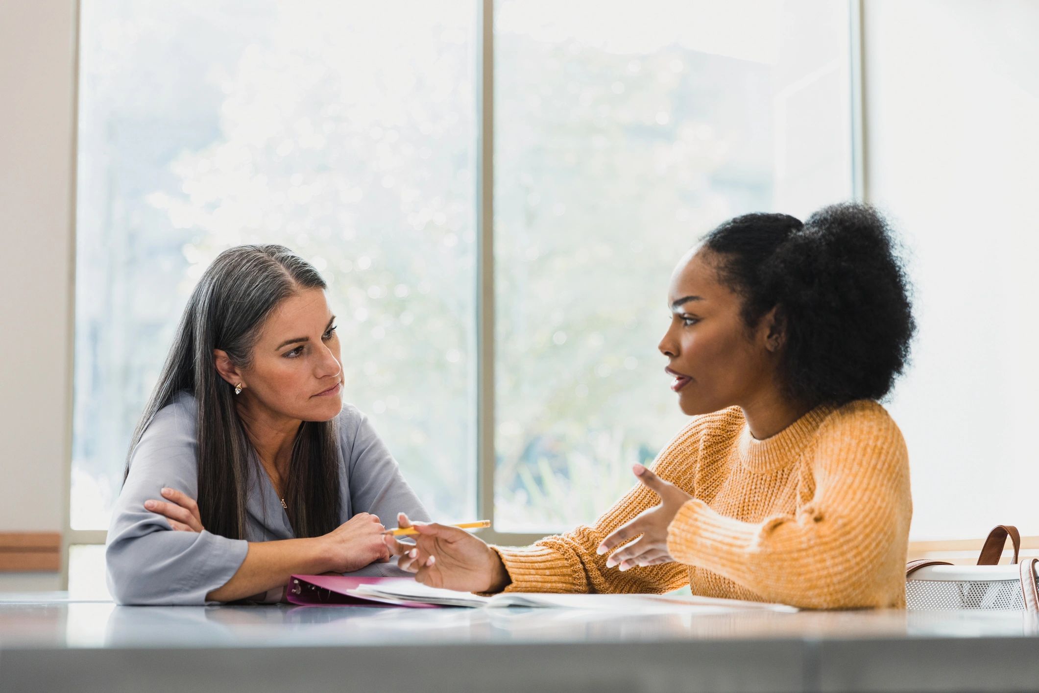 Career mentor supporting a student during a guidance session