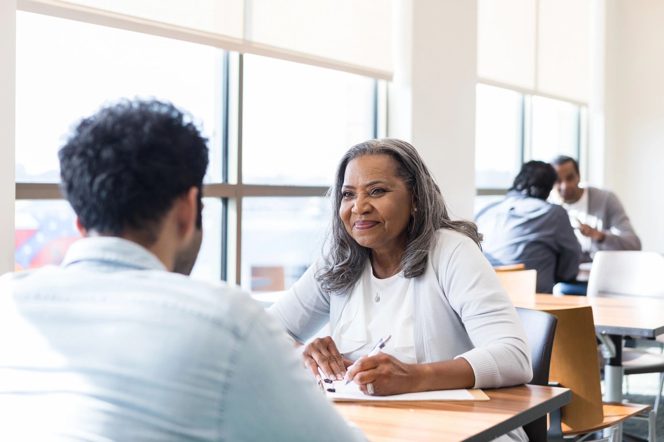 Career counselor meeting with a student