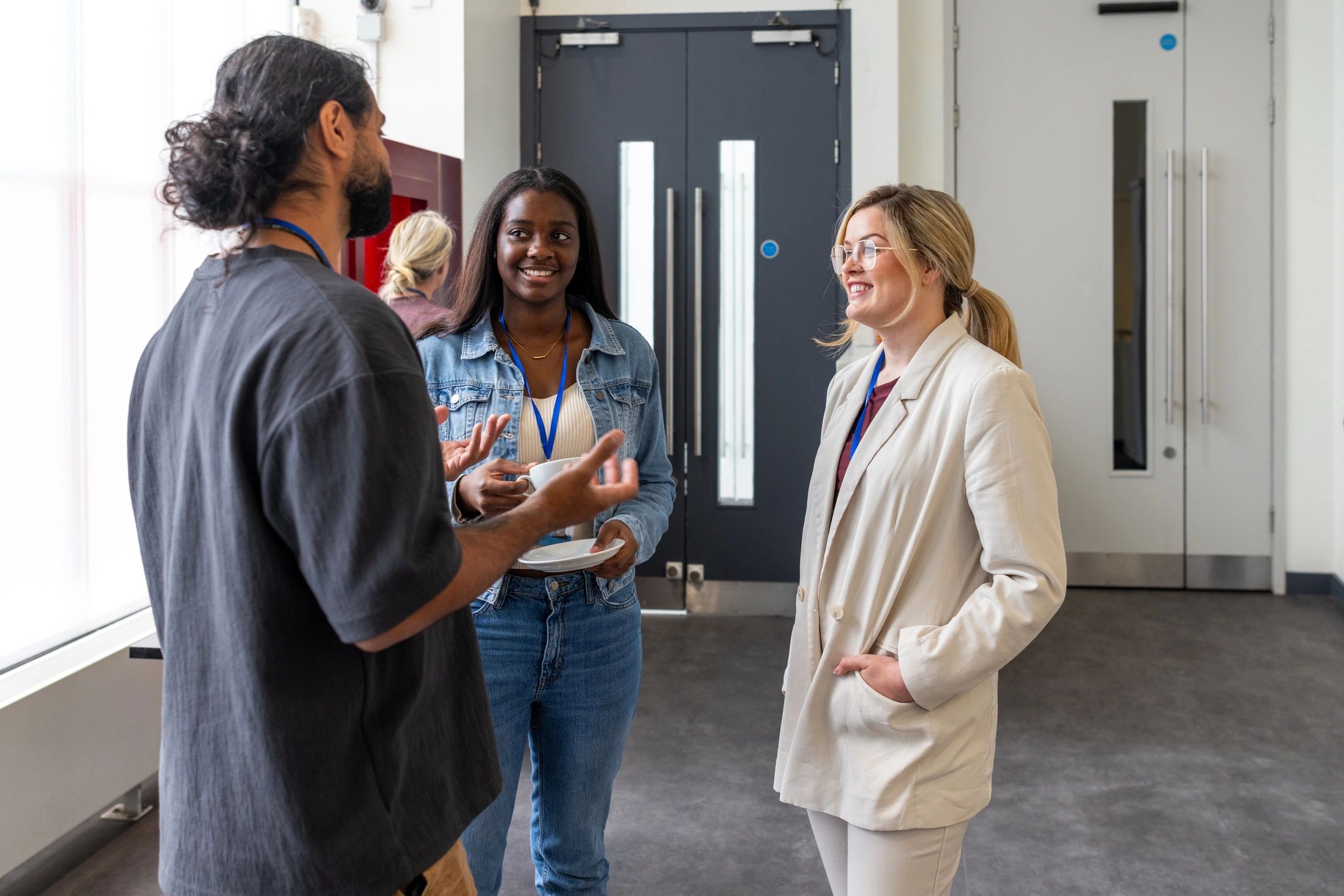 Young professionals networking at a career event