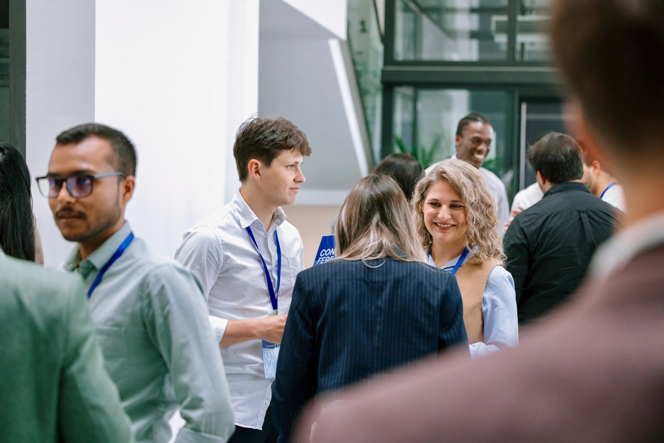 Young professionals networking at a career event